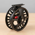 Axon ECLIPSE™ black reel — sealed conical drag detail and anti-glare finish